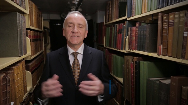 Video Reference: library, official, archivist, librarian, suit, Person