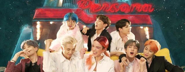 Video Reference: Event, Fun, Drama, Person, Group, Child, Standing, Young, People, Food, Man, School, Table, Birthday, Cake, Woman, Boy, Sitting, Talking, Girl, Train, Holding, Red, Old, Umbrella, Human face, Smile, Clothing, Crowd