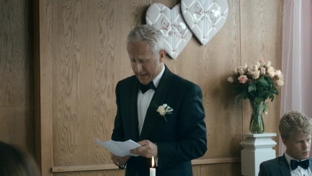 Video Reference: suit, official, speech, event, ceremony, formal wear, tuxedo, Person