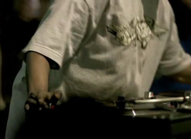 Video Reference: disc jockey, hand, string instrument, arm, percussion, finger, human body, indoor games and sports, material, Person