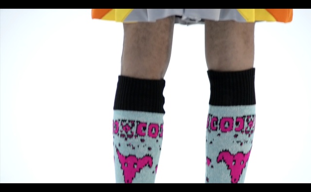 Video Reference: fashion accessory, sock, joint, human leg, tights, arm, thigh, shoe, product, font, Person