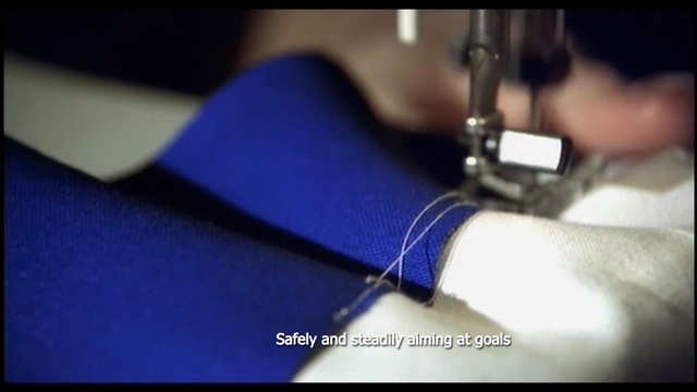 Video Reference: Sewing machine, Sewing, Blue, Finger, Hand, Close-up, Textile, Electric blue, Art, Leather