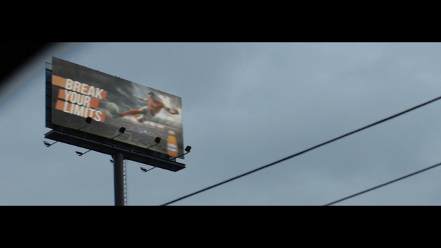 Video Reference: Billboard, Advertising, Sky, Technology, Display advertising, Electronic device, Cloud, Display device, Signage, Person