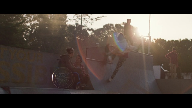 Video Reference: Photograph, Light, Sunlight, Morning, Atmospheric phenomenon, Lens flare, Snapshot, Sky, Photography, Bicycle motocross, Photo, Window, Man, Table, Sitting, Holding, Woman, People, Dog, Standing, Street, Large, Riding, Display, Food, White, Group, Text, Person
