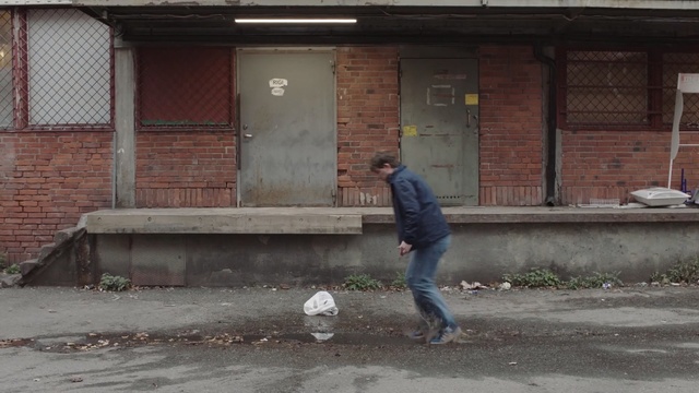 Video Reference: Wall, Standing, Asphalt, Brickwork, Sidewalk, Concrete, Window, Facade, Brick, Person