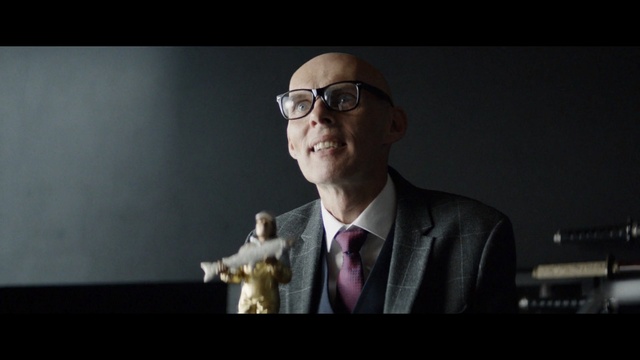 Video Reference: Eyewear, Photograph, Suit, Gentleman, Public speaking, Male, Microphone, Vision care, Snapshot, Speech