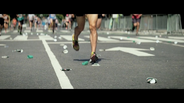 Video Reference: footwear, day, lane, shoe, asphalt, recreation, physical fitness, arm, race, physical exercise, Person