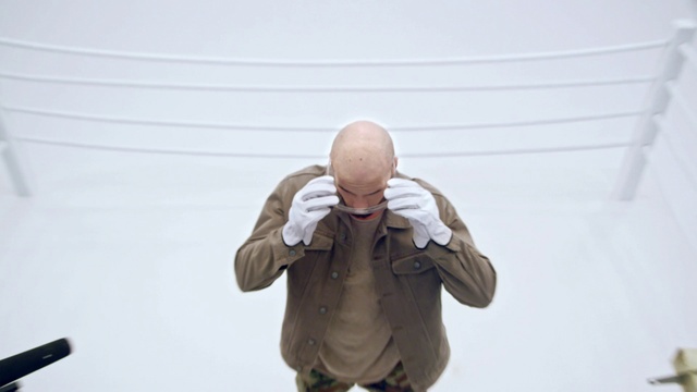 Video Reference: Head, Standing, Figurine, Hand, Outerwear, Finger, Sculpture, Gesture, Action figure, Fictional character