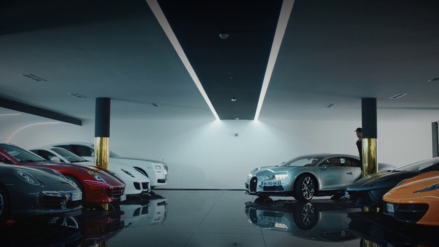 Video Reference: Vehicle, Car, Auto show, Car dealership, Sports car, Building, Parking, Supercar
