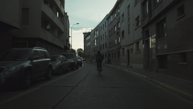 Video Reference: Black, White, Road, Street, Urban area, Lane, Monochrome, Town, Black-and-white, Neighbourhood, Person