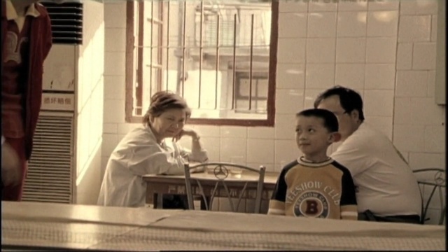 Video Reference: photograph, snapshot, sitting, girl, conversation, fun, furniture, window, restaurant, smile, Person