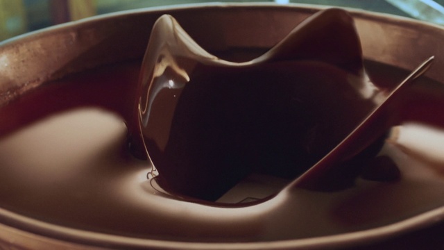 Video Reference: Chocolate syrup, Chocolate, Food, Cup, Cup, Dessert, Chocolate pudding, Coffee cup, Cuisine, Tableware