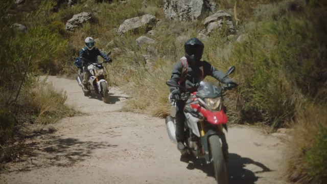 Video Reference: Land vehicle, Motorcycle, Motorcycling, Vehicle, Dirt road, Adventure, Trail, Off-roading, Soil, Enduro, Person