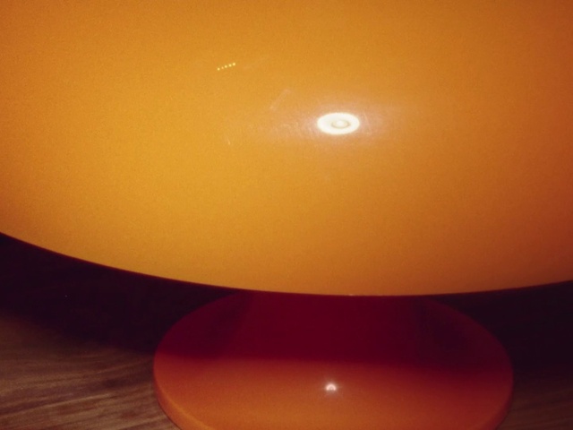 Video Reference: Atmosphere, Table, Amber, Lamp, Orange, Wood, Astronomical object, Material property, Heat, Circle