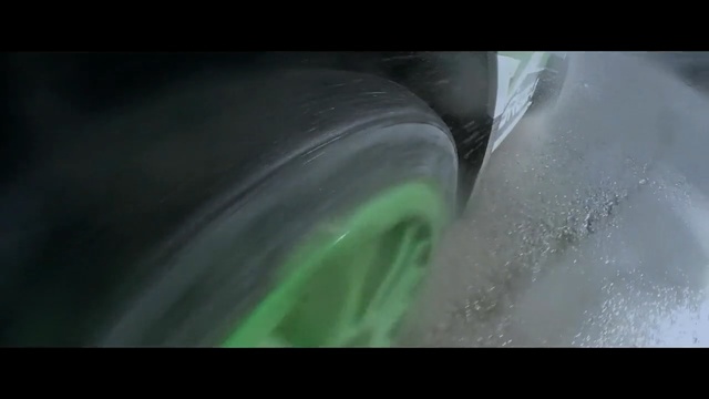 Video Reference: Automotive tire, Tire, Green, Alloy wheel, Wheel, Rim, Auto part, Automotive wheel system, Automotive design, Automotive lighting, Person