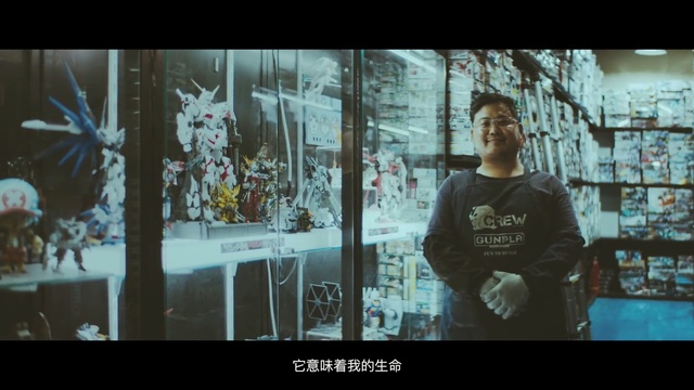 Video Reference: Snapshot, Text, Human, Adaptation, Organism, Cool, Font, Digital compositing, Photography, Art, Person, Man, Window, Holding, Standing, Building, Television, Front, Sitting, Woman, Display, Table, Young, Screen, Large, Remote, Room, Video, Store, Sign, White, Screenshot, Human face, Clothing