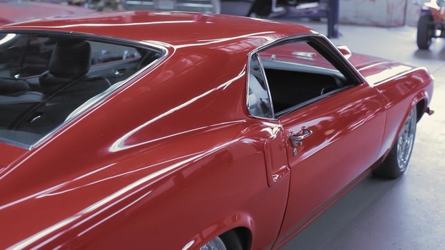 Video Reference: car, land vehicle, motor vehicle, vehicle, automotive design, sports car, muscle car, automotive exterior, vintage car, ford mustang mach 1