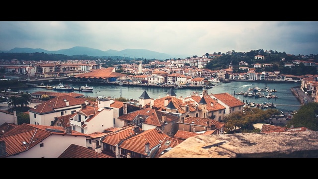 Video Reference: Sky, Town, City, Urban area, Human settlement, Cloud, Roof, Tourism, Sea, Neighbourhood