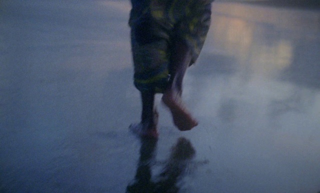 Video Reference: Reflection, Water, Sky, Atmospheric phenomenon, Leg, Standing, Puddle, Footwear, Cloud, Atmosphere