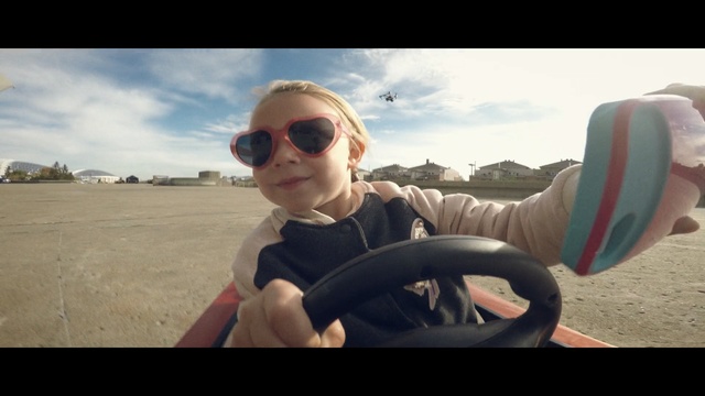 Video Reference: eyewear, sunglasses, human hair color, mode of transport, vacation, vision care, fun, sky, glasses, photography