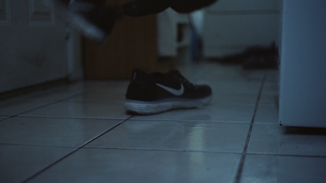 Video Reference: Footwear, Black, White, Shoe, Blue, Floor, Leg, Flooring, Hardwood, Room