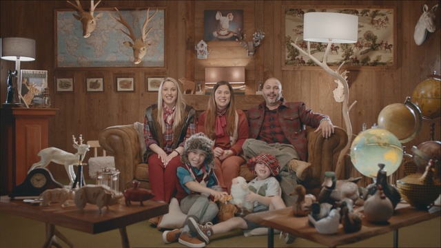 Video Reference: sofa, family, man, woman, children, girl, boy, room, home, fun, smile, Person