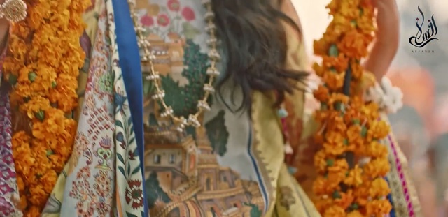 Video Reference: Fashion, Textile, Leaf, Neck, Art, Autumn, Pattern, Pattern, Tradition, Fashion accessory, Person