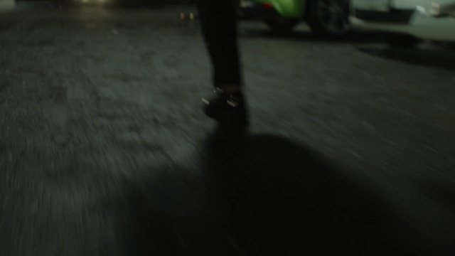 Video Reference: Black, Darkness, Green, Floor, Light, Footwear, Flooring, Night, Snapshot, Midnight
