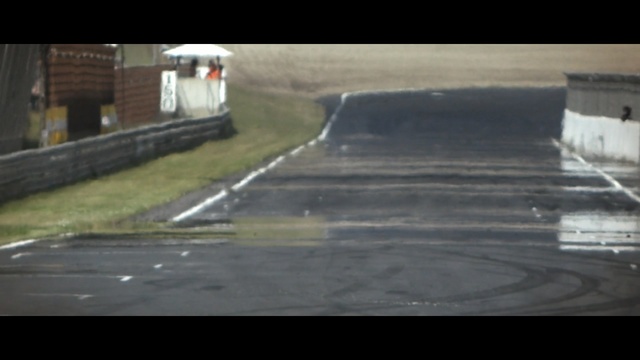 Video Reference: Asphalt, Mode of transport, Road surface, Race track, Drifting, Road, Vehicle, Lane, World rally championship, Sport venue