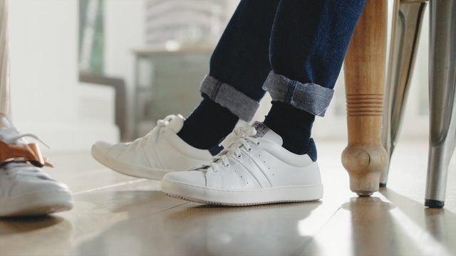 Video Reference: Footwear, Shoe, White, Plimsoll shoe, Ankle, Leg, Sneakers, Beige, Human leg, Flooring