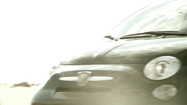 Video Reference: Land vehicle, Vehicle, Car, City car, Motor vehicle, Hood, Fiat 500, Automotive lighting, Subcompact car, Compact car