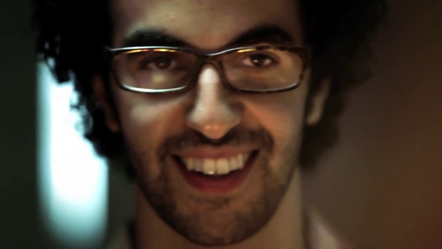 Video Reference: Eyewear, Face, Hair, Forehead, Facial hair, Eyebrow, Glasses, Nose, Tooth, Chin