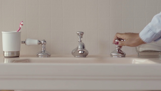 Video Reference: Tap, Hand, Room, Plumbing fixture, Glass, Metal