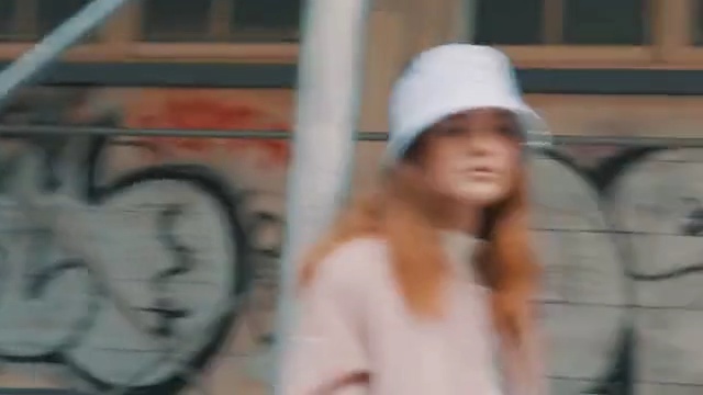 Video Reference: photograph, woman, facial expression, girl, head, snapshot, headgear, product, fun, cool, Person