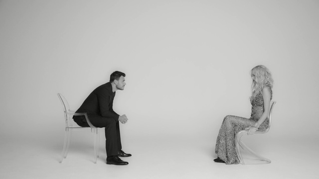 Video Reference: photograph, sitting, black and white, furniture, monochrome photography, chair, photography, standing, monochrome, human behavior