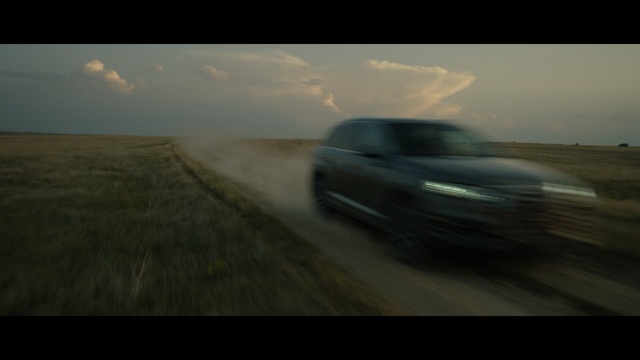 Video Reference: car, land vehicle, road, motor vehicle, ecosystem, mode of transport, vehicle, automotive design, sky, driving