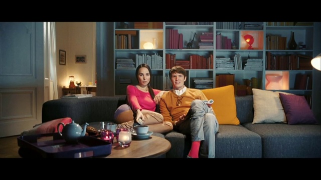 Video Reference: Living room, Photograph, Couch, Room, Furniture, Sitting, Snapshot, Conversation, Interior design, Fun, Person