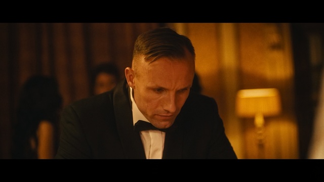 Video Reference: Photograph, Gentleman, Suit, Forehead, Human, Photography, Photo caption, Formal wear, Screenshot, Official