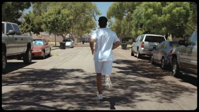 Video Reference: car, road, vehicle, infrastructure, tree, walking, recreation, pedestrian, street, asphalt, Person