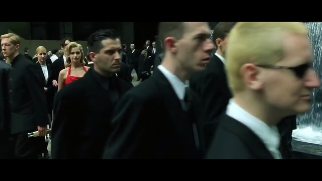 Video Reference: suit, official, crowd, gentleman, event, formal wear, audience, speech, bodyguard, screenshot, Person