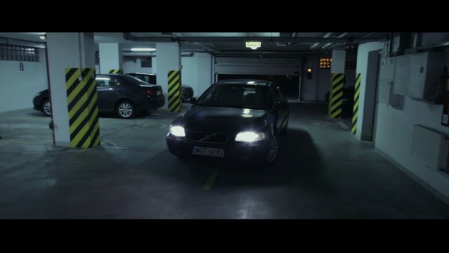 Video Reference: Car, Vehicle, Parking, Automotive lighting, Mode of transport, Headlamp, Compact car, Subcompact car, Parking lot, Indoor, Room, Table, Small, Luggage, Sitting, Computer, Living, Laptop, Desk, Street, Television, City, Man, Suitcase, White, Remote, Riding, Land vehicle, Wheel, Text, Auto part, Tire