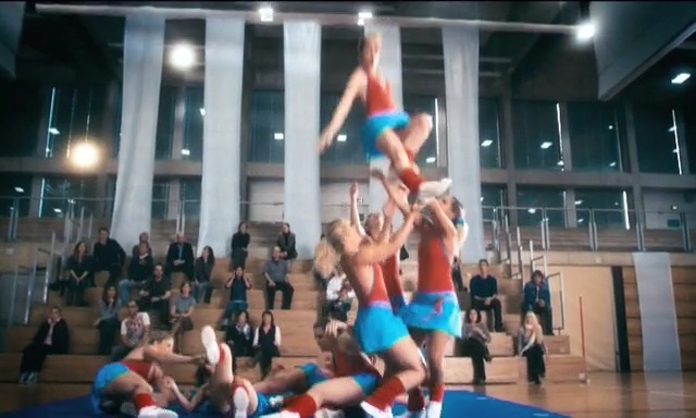 Video Reference: sport venue, blue, basketball moves, sports, cheerleading, team sport, competition, physical fitness, performance, fun, Person