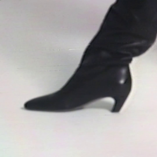Video Reference: Footwear, High heels, Black, Leg, Shoe, Boot, Joint, Ankle, Human body, Foot