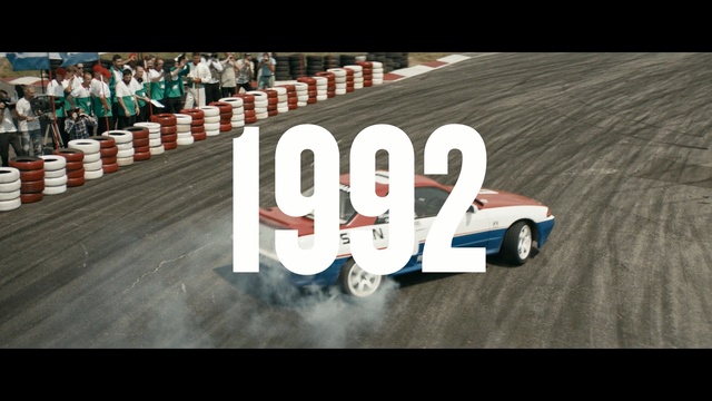 Video Reference: car, race track, vehicle, mode of transport, automotive design, race car, sports car racing, race, racing, open wheel car, Person