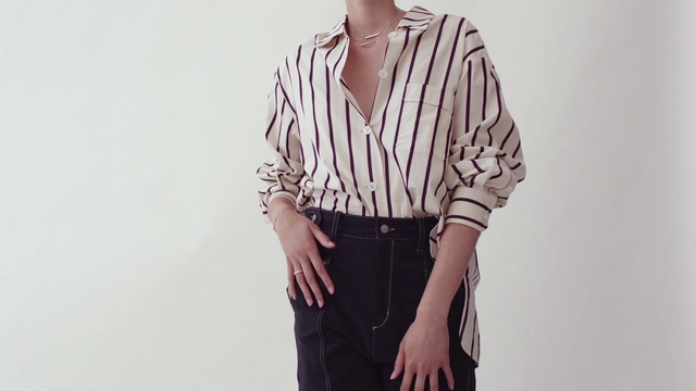 Video Reference: Clothing, White, Shoulder, Neck, Sleeve, Waist, Joint, Blouse, Shirt, Outerwear