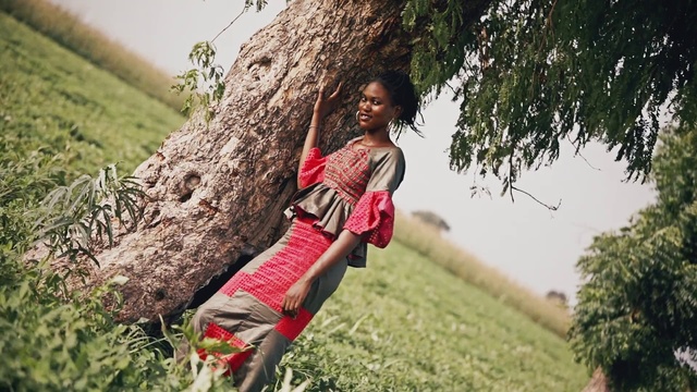 Video Reference: People in nature, Beauty, Tree, Grass, Spring, Summer, Photography, Plant, Lawn, Person, Outdoor, Young, Standing, Man, Field, Water, Woman, Holding, Wearing, Walking, Red, Girl, Throwing, Boy, Green, Hill, White, Board, Riding, Grassy, River, Flying, Game, Clothing, Fashion, Human face, Dress