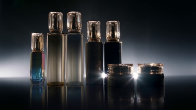 Video Reference: Glass bottle, Water, Reflection, Light, Bottle, Liquid, Glass, Still life photography, Perfume, Drinkware, Thing, Table, Sitting, Counter, Clock, Cylinder