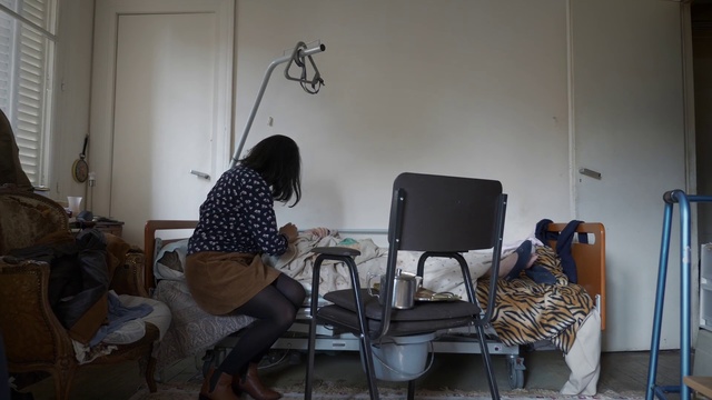 Video Reference: Room, Chair, Furniture, Sitting, House, Interior design, Floor, Living room, Art