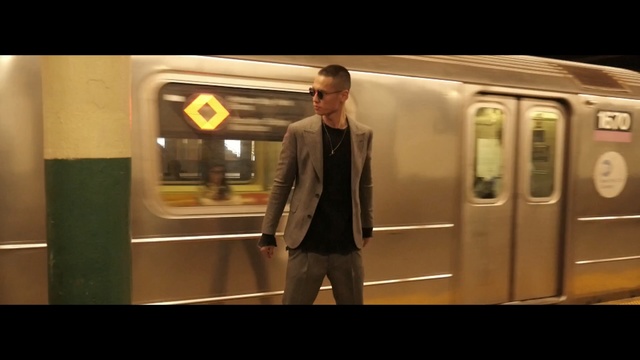 Video Reference: public transport, mode of transport, transport, rapid transit, snapshot, standing, railroad car, fun, rolling stock, screenshot, Person