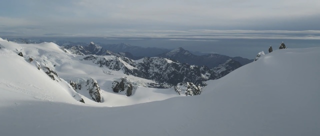Video Reference: mountainous landforms, ridge, mountain range, nunatak, mountain, massif, snow, winter, sky, arête